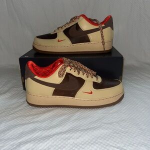 Nike Brown and Red Sneakers with Reversed Swoosh